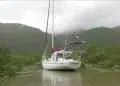 Hurricane Hole - Boat with lines in a canal