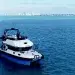 The Explorer 46, a hydrofoil power catamaran, anchored at Stiltsville.