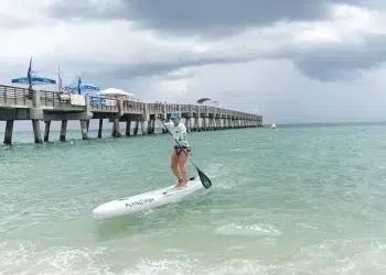 A Paddler reaches the Beach after Crossing for Cystic Fibrosis