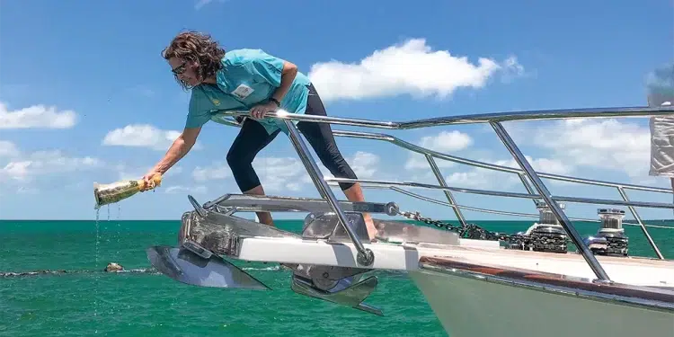 A Woman Christens her Boat