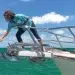 A Woman Christens her Boat