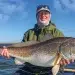 How to set the hook fishing success - man holds his catch