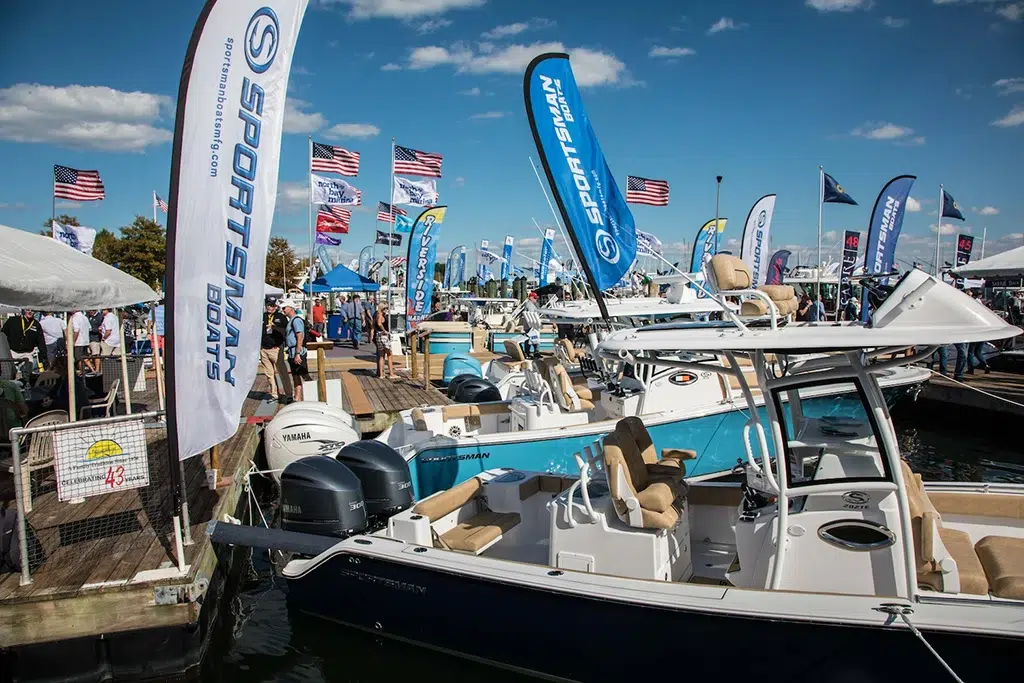 A boat infront of docks at the Annapolis Powerboat show 2024