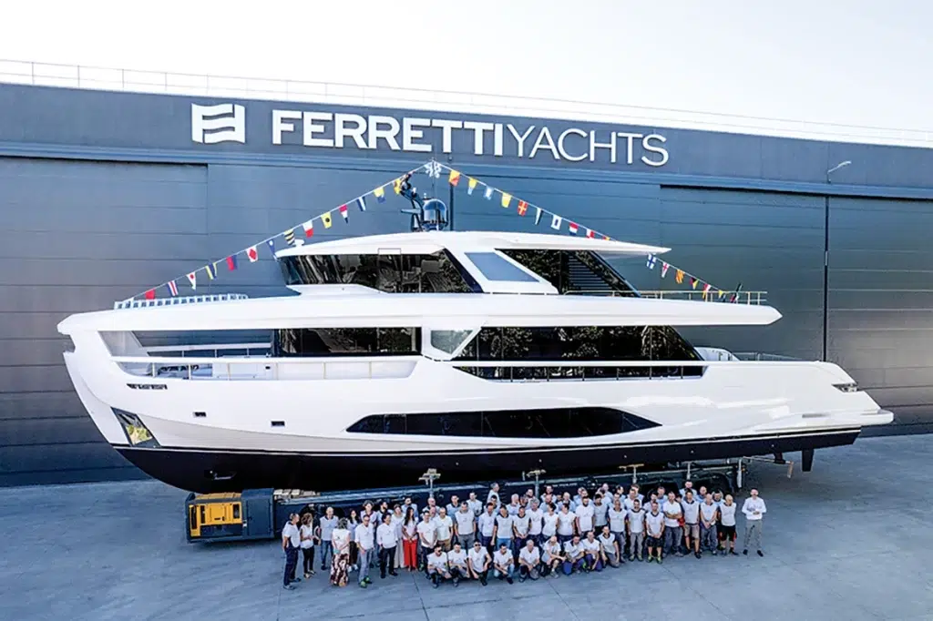 Ferretti Yacht with staff in-front of it