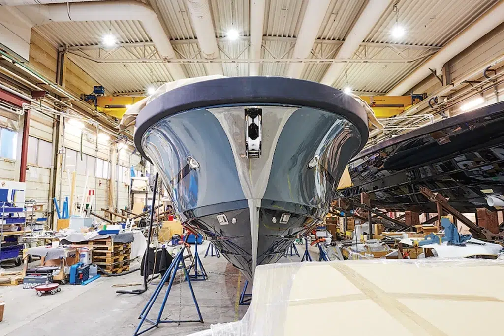 Windy boats with vessels in production warehouse