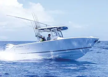 The Cobia 285CC running across near glass-like water