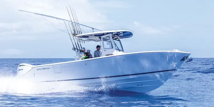 The Cobia 285CC running across near glass-like water
