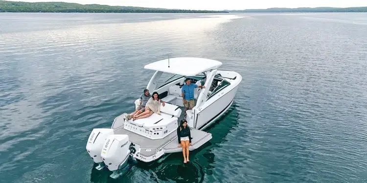 Four Winns H9 anchored showing its enhanced swim platform