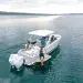 Four Winns H9 anchored showing its enhanced swim platform