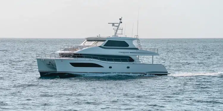 The Horizon Power Catamaran PC68 rides the horizon at a cruising speed