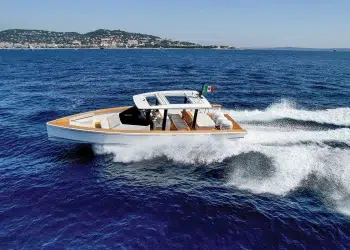 The Nautor Swan Shadow 42 making a sharp port-side turn in deep blue waters