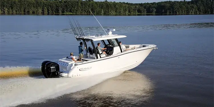The Robalo R300 cuts across mirror smooth waters