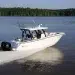 The Robalo R300 cuts across mirror smooth waters