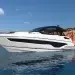 The Sunseeker Predator 55 anchored by an island