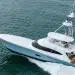 A drone shot of the Viking 82 running across water