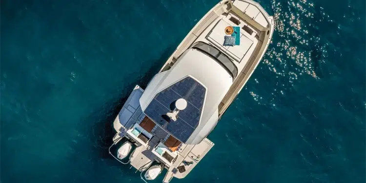 A bird's eye view of the YOT 36 power catamaran anchored in open waters