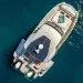 A bird's eye view of the YOT 36 power catamaran anchored in open waters