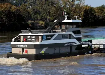 A Hydrogen Powered Boat Cruises along the water