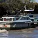 A Hydrogen Powered Boat Cruises along the water