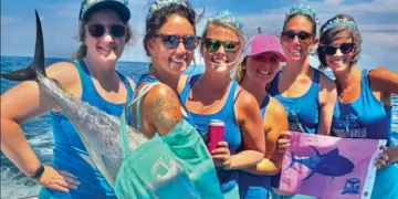 Six women pose for the Tuna and Tiaras Ladies Fishing Tournament