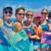 Six women pose for the Tuna and Tiaras Ladies Fishing Tournament