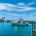 A refit Hatteras 41C exiting a dock
