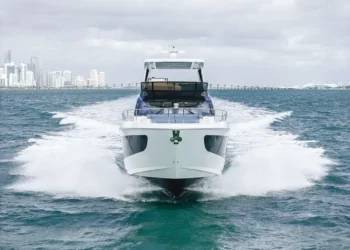 Front view of Cruisers Yachts' 57 FLY while running across water