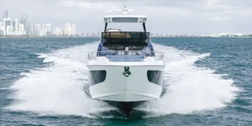 Front view of Cruisers Yachts' 57 FLY while running across water