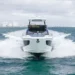 Front view of Cruisers Yachts' 57 FLY while running across water