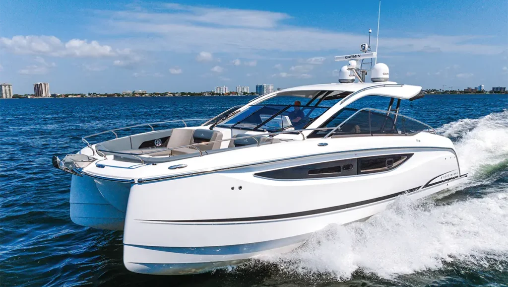 Four Winns Catamaran cutting across open water