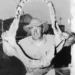A man poses with shark jaws