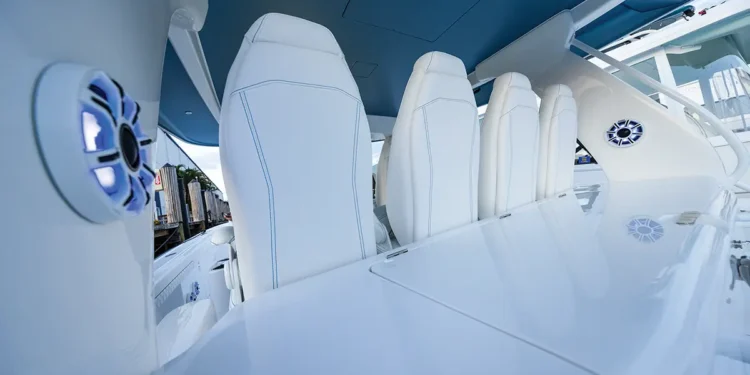 Kicker Marine Audio speaker system installed on a boat with white upholstery