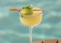basil and cucumber cocktail on a table