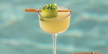 basil and cucumber cocktail on a table
