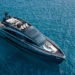 Pershing GTX-80 anchored in blue waters aerial view