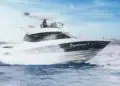 TOMA-TOP on the flybridge of a yacht running across water