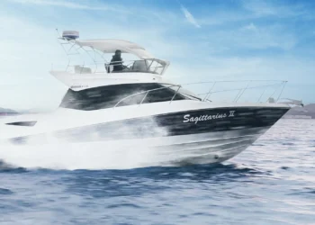 TOMA-TOP on the flybridge of a yacht running across water