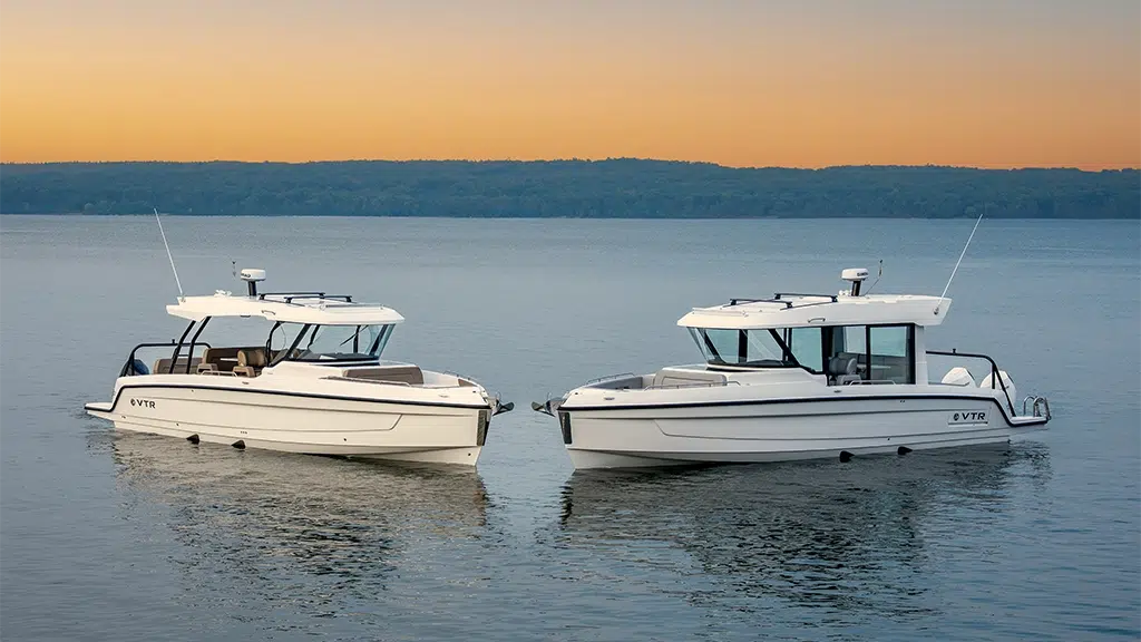 Cruisers Yachts 38 VTR fleet side profile and anchored with bows facing each other