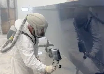 Awlgrip yacht paint being applied to a vessel