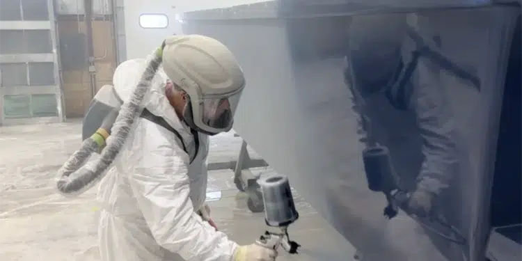 Awlgrip yacht paint being applied to a vessel