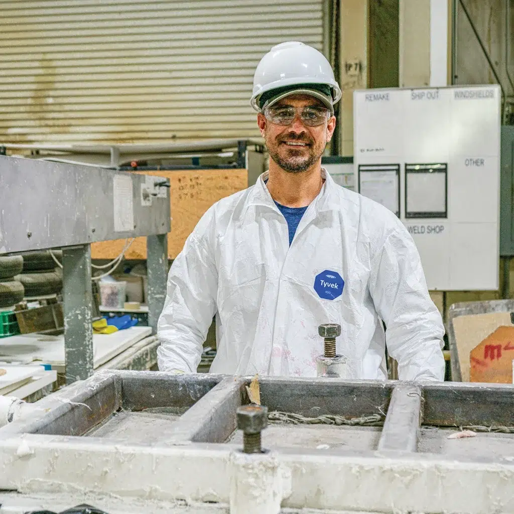 Pursuit Boats technician working on a mold in the factory