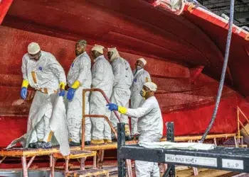 Pursuit Boats factory workers standing inside hull