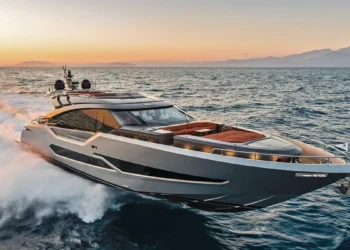 AB Yachts AB 80 running at speed at sunset, throwing a white waterjet wake