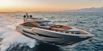 AB Yachts AB 80 running at speed at sunset, throwing a white waterjet wake