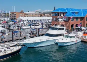 Power yachts on display on the docks at the Newport International Boat Show