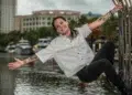 Private yacht chef Robyn Almodovar in chef’s whites at a waterfront gate