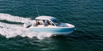 Beneteau Flyer 30 day boat running at speed on twin Mercury outboards