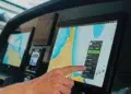 Simrad NSO 4 MFD in six-way split screen at a flush-mount helm